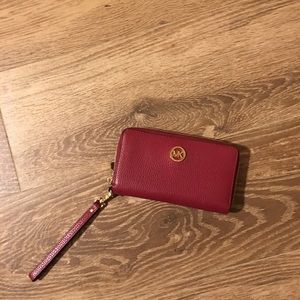 Michael Kors wristlet with smartphone holder